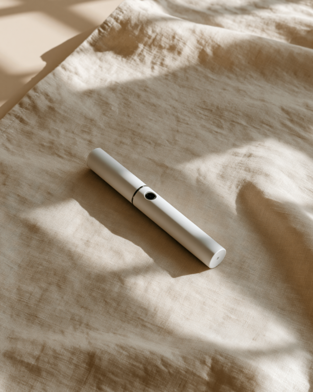 Brand-name GLP-1 medication pen on soft linen